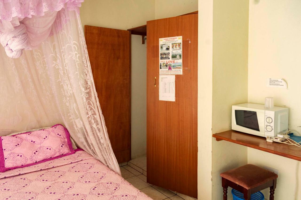 Sunrise Apartments Hotel Fort Portal Luaran gambar